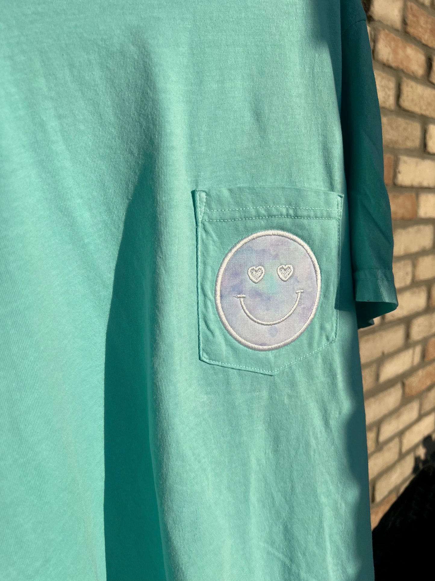 Smiley App. Pocket T-Shirt
